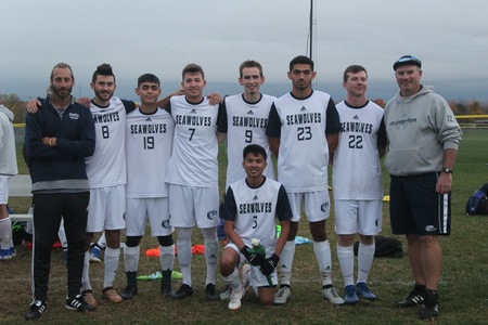 From left to right: Assistant Coach Alex Jenkins, Maxwell Pushaw, Syohga Cusumano, Yaroslav Philbrook, Stephen Brady, Orion Beers, Jonathan Bryant, Head Coach Brian Dougher, and Sereyreach Dy.